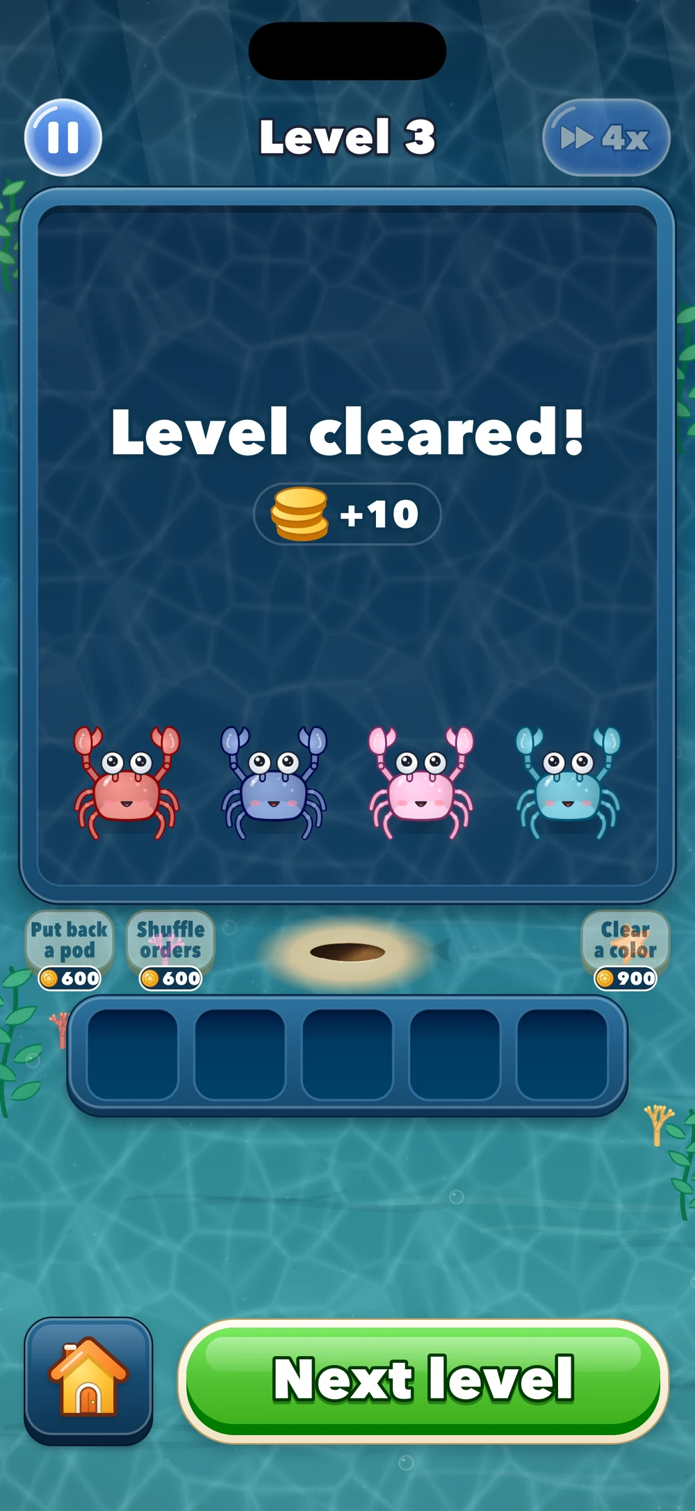 Level cleared, with four cheering crabs and a gold coin reward