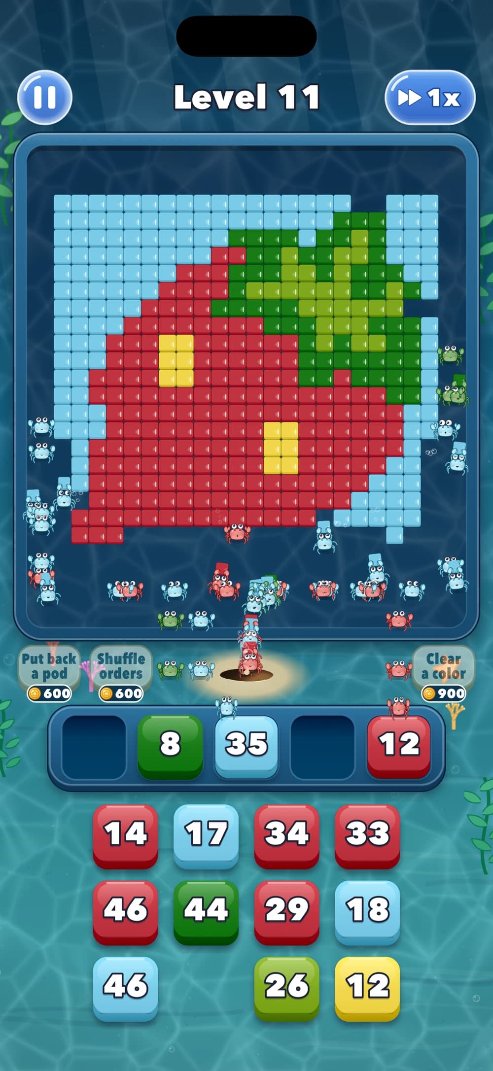 A strawberry picture made of colored blocks on a dark glass tablet, with little crabs carrying blocks home and numbered orders waiting below